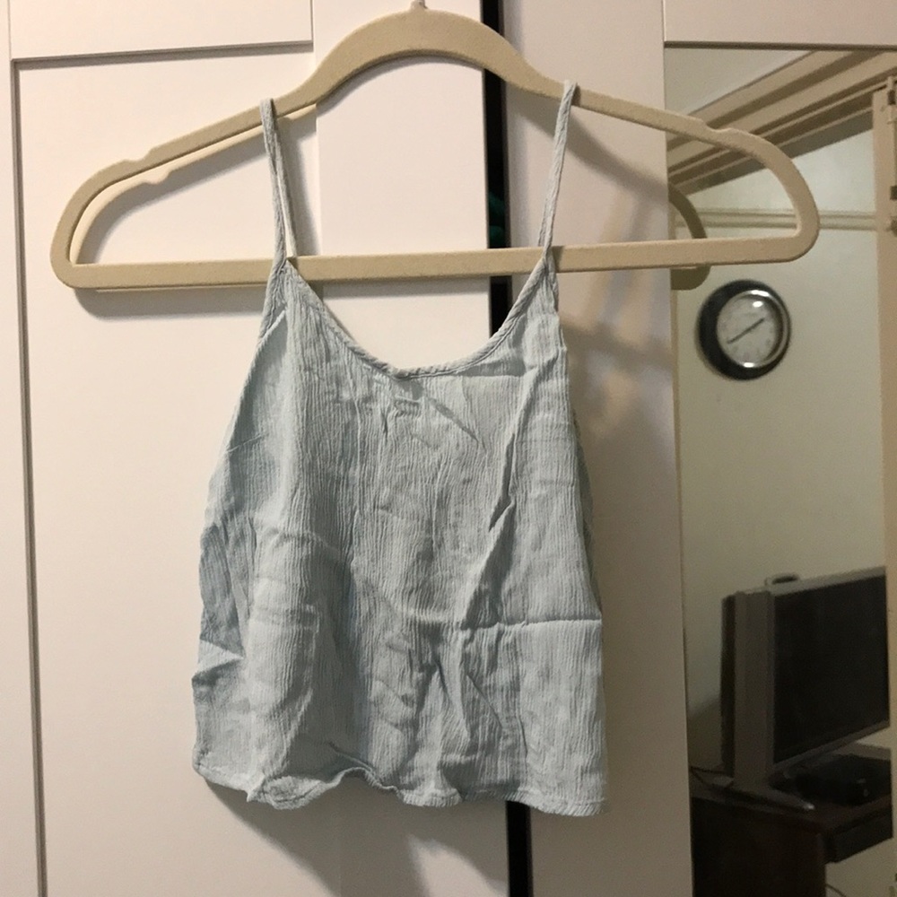 Light blue crop tank top with back tie details!